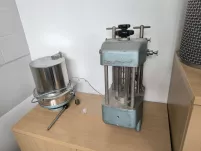 Laboratory equipment with a granulator, grinder, and piston feeder | Erweka - 2