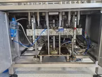 Linia dozująco-zakręcająca do płynów | Metax - 11