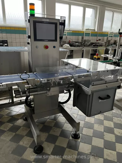 Dynamic checkweigher with reject system